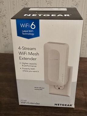 netgear AX1600 WiFi Mesh Extender in White and Black